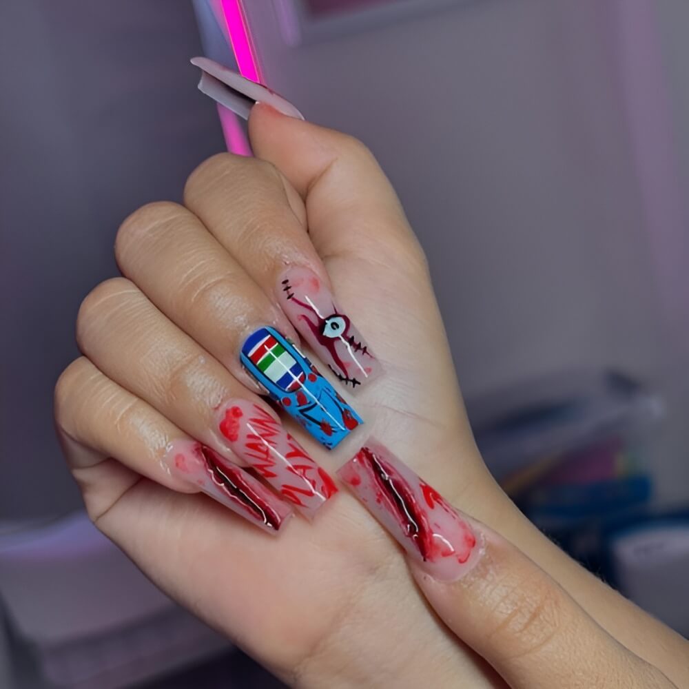 Halloween nails inspired by Chucky's signature striped clothes and overalls Beautiful Halloween nails ideas