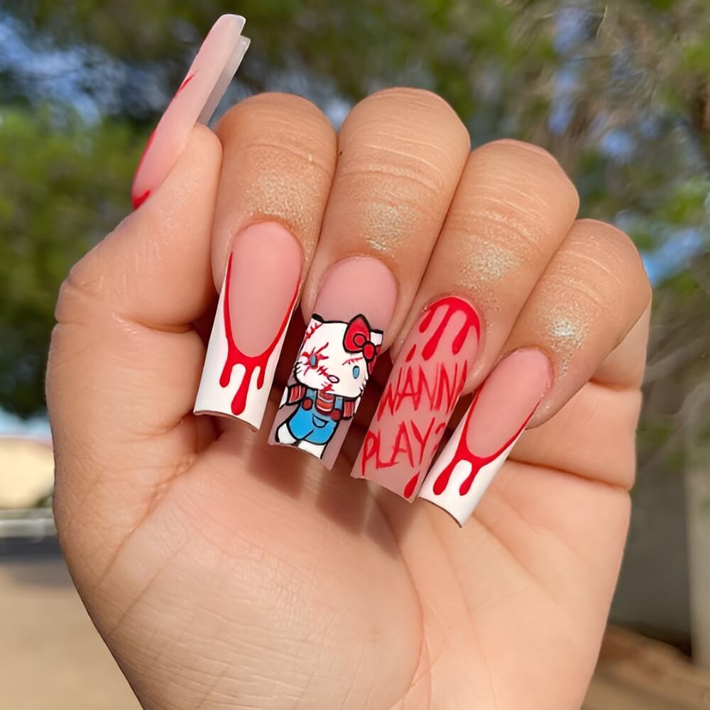 Chucky and Hello Kitty mashup nail design for a spooky-cute Halloween vibe. Beautiful Halloween nails ideas