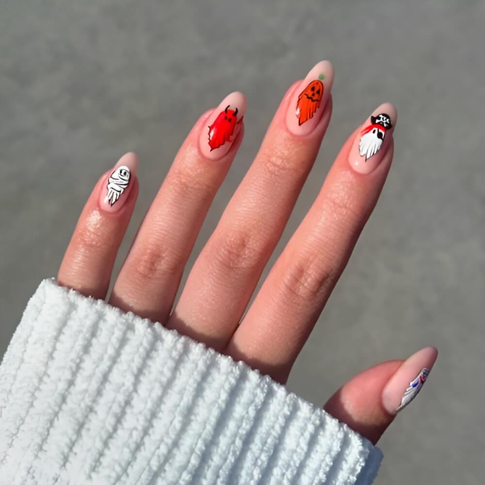 Halloween nails with different ghost characters – pirate, devil, and more spooky personalities. Beautiful Halloween nails ideas