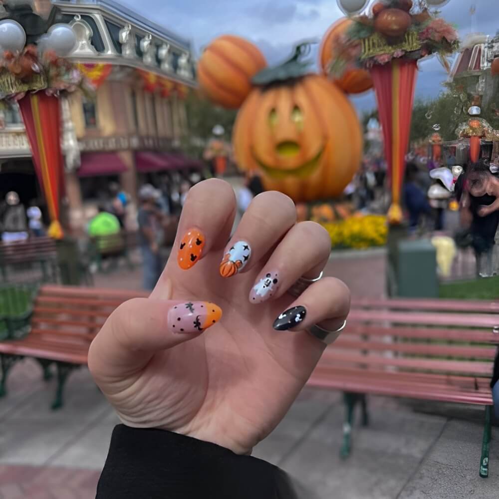 Disney-inspired Halloween nails – magical spooky nail art featuring iconic characters.
