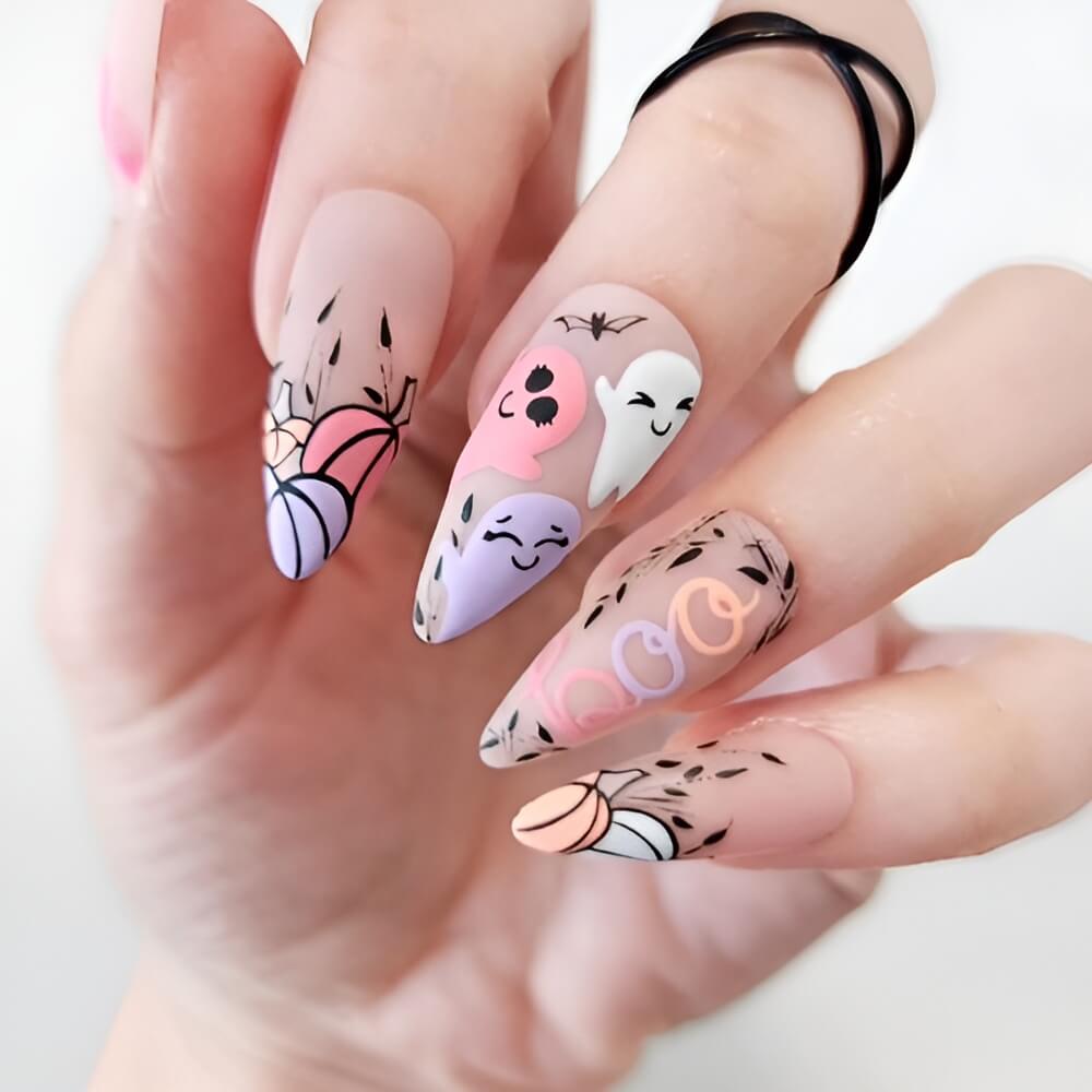 Pastel Halloween nails with cute and soft spooky art – non-traditional Halloween nail idea. Beautiful Halloween nails ideas