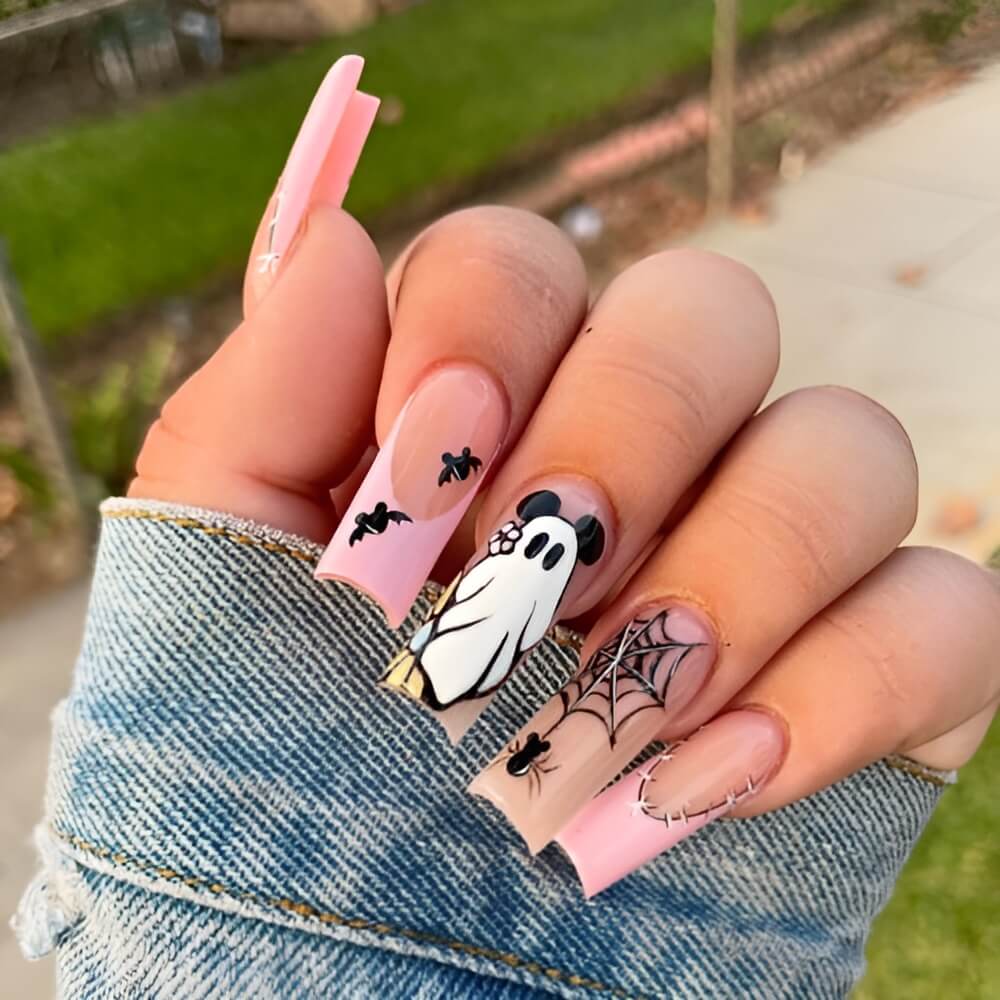 Cute pink French nails with Disney ghost characters for Halloween Beautiful Halloween nails ideas