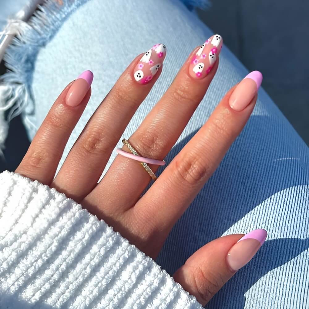 Cute pink French Halloween nails with adorable little ghosts – fun and girly spooky nail idea. Beautiful Halloween nails ideas