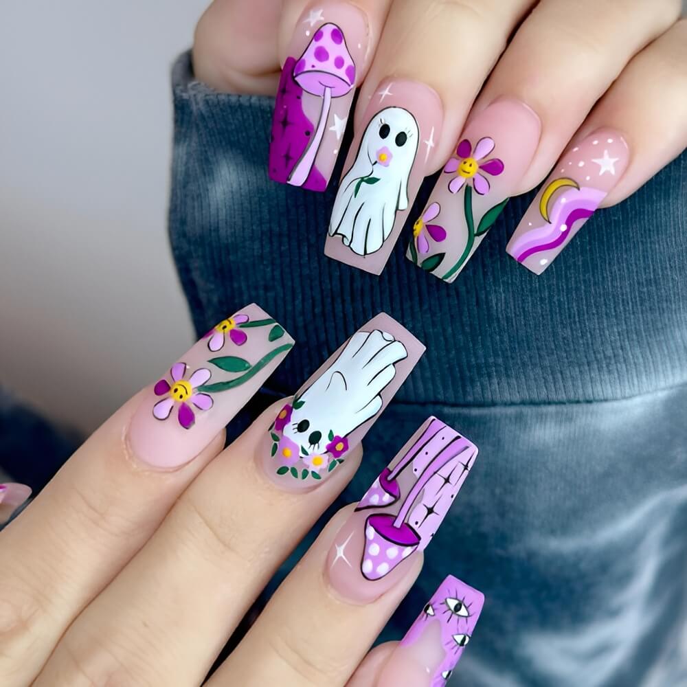Purple Halloween nails with eerie forest and moon silhouettes – moody and mystical nail design. Beautiful Halloween nails ideas