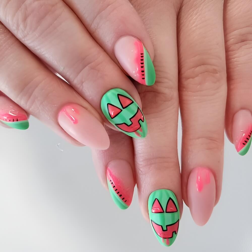 Watermelon-inspired Halloween nails – unexpected twist on Halloween nail art.