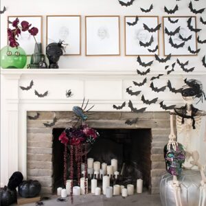 Paper bats flying across a living room wall for simple and spooky Halloween decoration. Halloween Decor