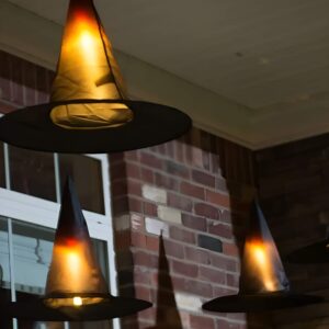 Floating witch hats with LED lights hanging from the ceiling for spooky Halloween hallway decor. Halloween Decor