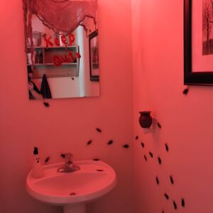 Foggy bathroom mirror with creepy red lipstick message for DIY Halloween decoration. Halloween Decor