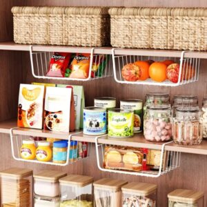 Under-shelf wire baskets adding extra storage for wraps and seasoning packets. Small pantry organization