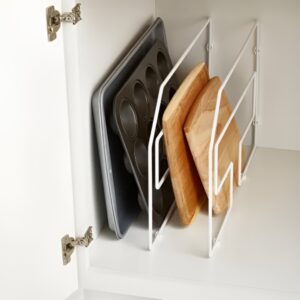 Vertical dividers storing cutting boards and baking sheets in small pantry cabinet. Small pantry organization