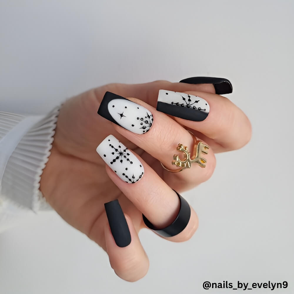 black-snowflakes-christmas-nail-ideas.jpg