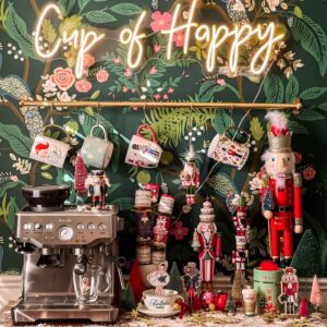 Hot cocoa station in the kitchen with Christmas mugs, candy canes, and cocoa toppings. Christmas Kitchen Decoration