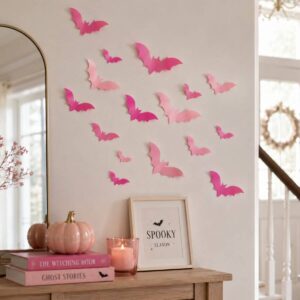 Blush and pastel bats arranged across a wall