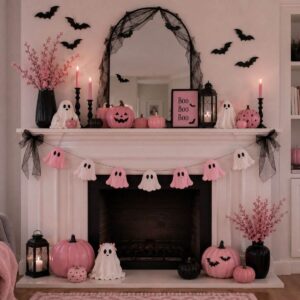 Pink and black Halloween mantel decorated with pumpkins and spooky accents