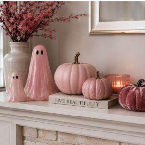 Cute pastel ghost decorations styled on a home shelf