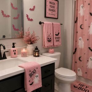 Bathroom decorated with cute pink Halloween accessories