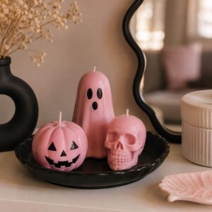 Spooky shaped candles arranged together on a table