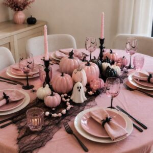 Pink Halloween tablescape decorated with cute and spooky table decor
